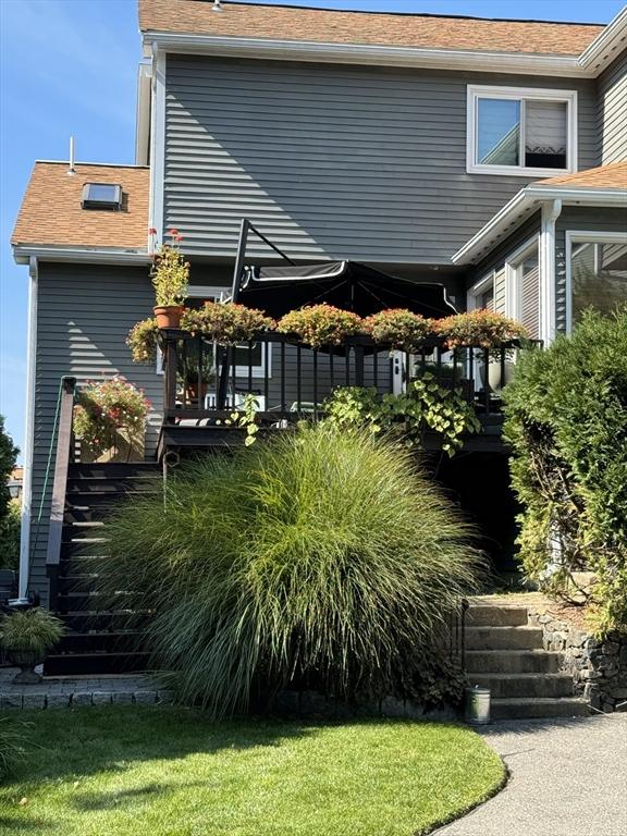 view of home's exterior with a lawn