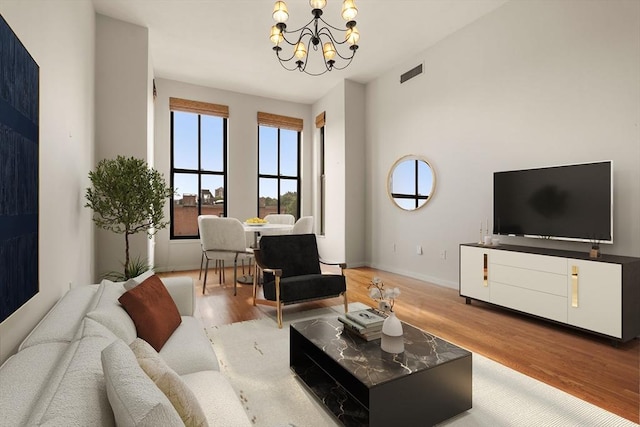 567 Tremont St Unit 20, Boston, MA 02118 - living room featuring a chandelier and wood finished floors