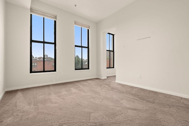 567 Tremont St Unit 20, Boston, MA 02118 - carpeted empty room featuring baseboards