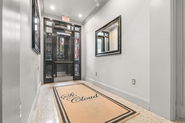 567 Tremont St Unit 20, Boston, MA 02118 - hallway with crown molding, granite floors, inlaid floor details, and recessed lighting