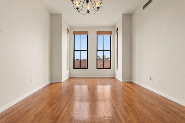 567 Tremont St Unit 20, Boston, MA 02118 - unfurnished room with a chandelier and light wood finished floors