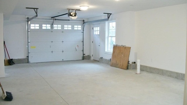 2 Mitchell Ln Unit B, Weymouth, MA 02190 - garage featuring a garage door opener
