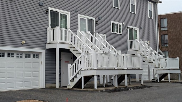 2 Mitchell Ln Unit B, Weymouth, MA 02190 - view of building exterior with stairs and an attached garage