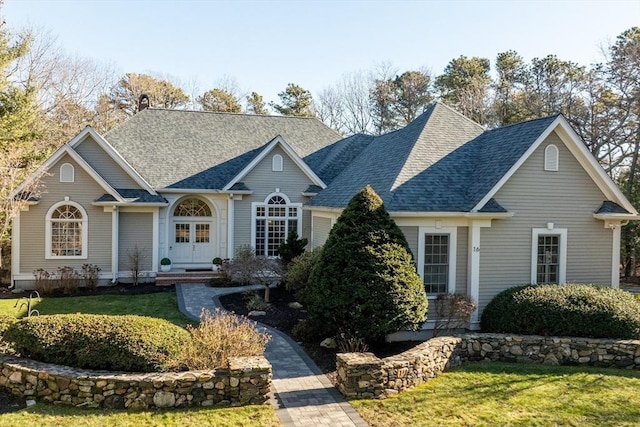 view of front of property with a front lawn