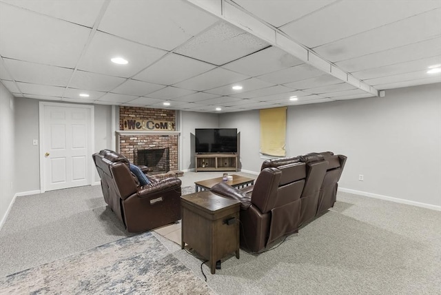 carpeted living room featuring a brick fireplace