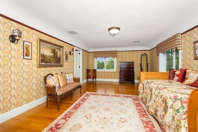 bedroom featuring hardwood / wood-style flooring