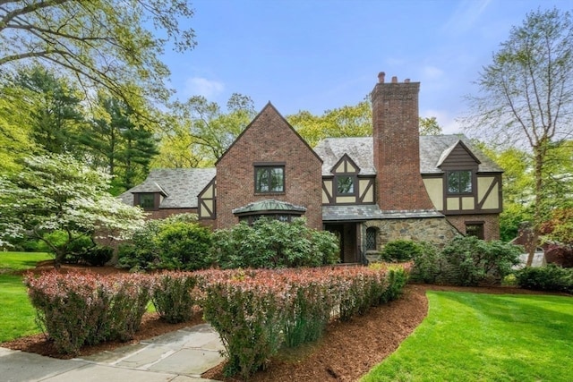 view of home's exterior with a yard