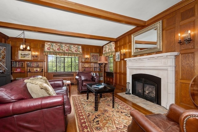 living room featuring beamed ceiling, wooden walls, and hardwood / wood-style flooring