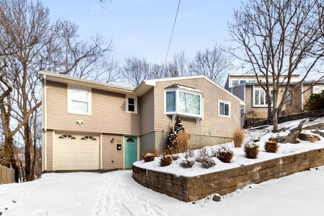 view of front of property featuring a garage