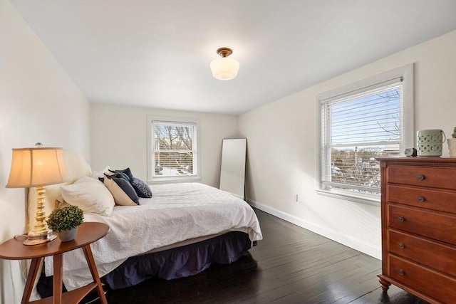 bedroom featuring dark hardwood / wood-style flooring