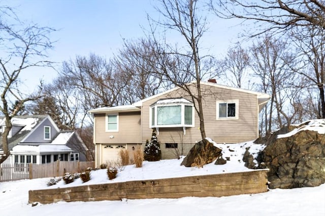 view of front of home with a garage