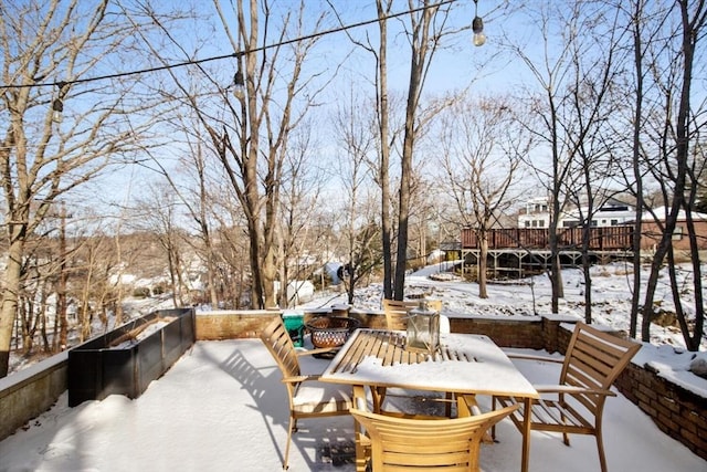 view of snow covered patio