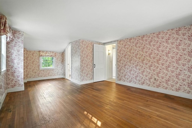 14 Wadsworth Ln, Duxbury, MA 02332 - spare room featuring wallpapered walls and wood-type flooring