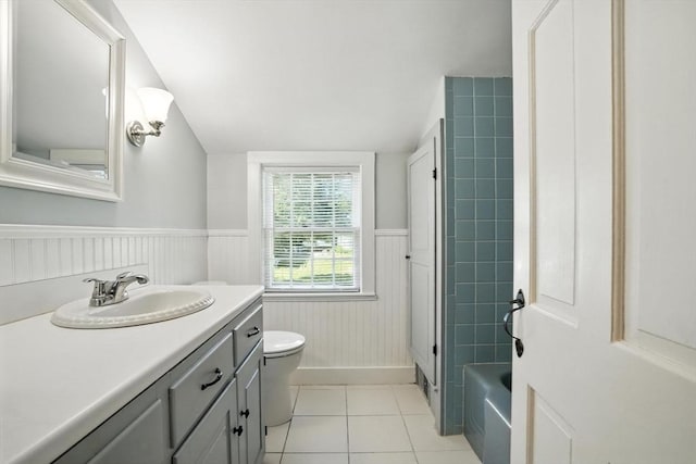 14 Wadsworth Ln, Duxbury, MA 02332 - full bathroom with tile patterned floors, vanity, vaulted ceiling, wainscoting, and bathtub / shower combination