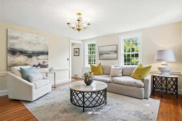 14 Wadsworth Ln, Duxbury, MA 02332 - living area with wood finished floors and a chandelier