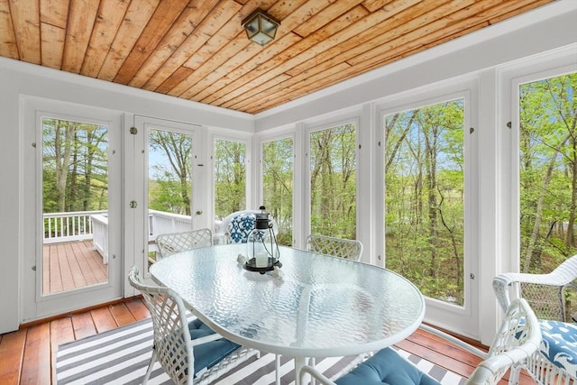 151 River Rd, West Newbury, MA 01985 - sunroom with wooden ceiling, french doors, outdoor dining space, and wood-type flooring