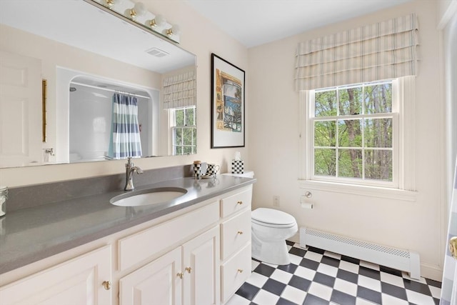 151 River Rd, West Newbury, MA 01985 - full bath with baseboard heating, healthy amount of natural light, tile patterned floors, and toilet