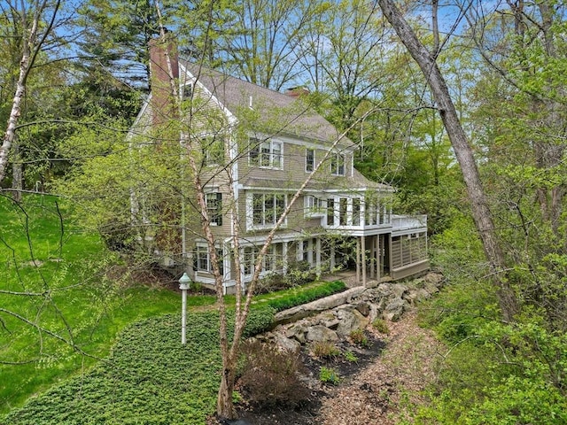 151 River Rd, West Newbury, MA 01985 - view of home's exterior with a chimney