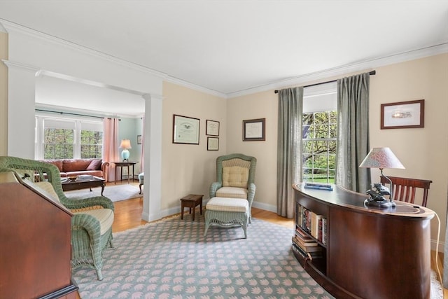 151 River Rd, West Newbury, MA 01985 - home office with crown molding, plenty of natural light, baseboards, and wood finished floors