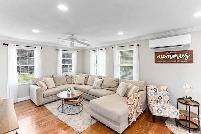 1380 Newman Ave, Seekonk, MA 02771 - living room with a wall unit AC, crown molding, recessed lighting, wood finished floors, and ceiling fan