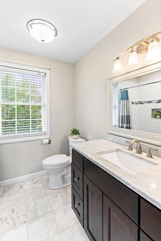 1380 Newman Ave, Seekonk, MA 02771 - bathroom with vanity, baseboards, toilet, a shower with curtain, and marble finish floors
