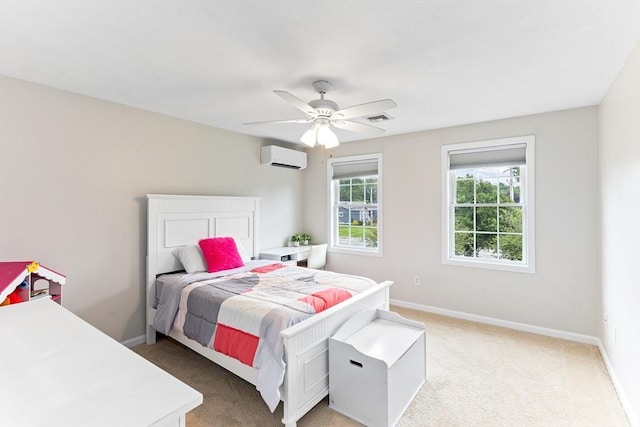 1380 Newman Ave, Seekonk, MA 02771 - bedroom with light carpet, a wall mounted AC, baseboards, and ceiling fan