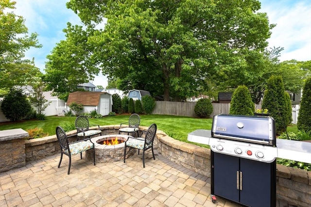 1380 Newman Ave, Seekonk, MA 02771 - view of patio featuring an outdoor fire pit and area for grilling