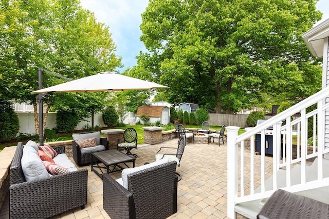 1380 Newman Ave, Seekonk, MA 02771 - fenced backyard featuring a patio, an outdoor living space with a fire pit, and stairs