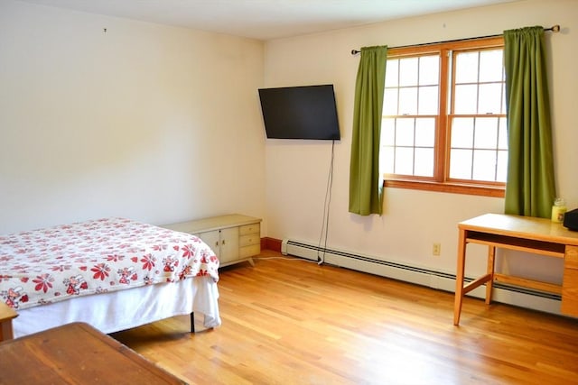 110 Mayflower Ridge Dr, Wareham, MA 02571 - bedroom featuring light wood-style floors and a baseboard radiator