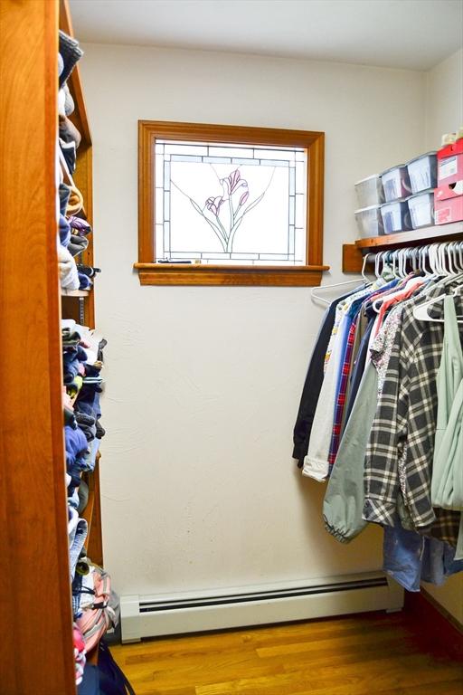 110 Mayflower Ridge Dr, Wareham, MA 02571 - spacious closet with a baseboard radiator and wood finished floors
