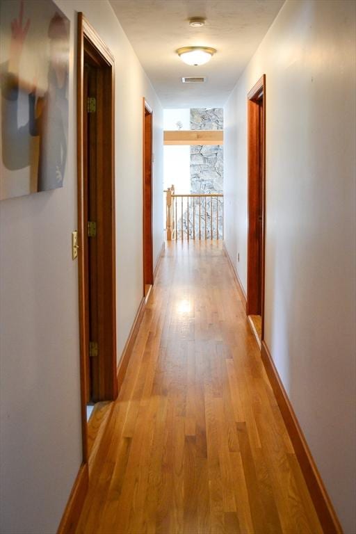 110 Mayflower Ridge Dr, Wareham, MA 02571 - corridor with light wood-style flooring and baseboards