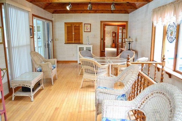 110 Mayflower Ridge Dr, Wareham, MA 02571 - living area featuring healthy amount of natural light, hardwood / wood-style flooring, baseboards, a baseboard radiator, and wallpapered walls