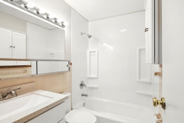 full bathroom featuring decorative backsplash, tile walls, vanity, toilet, and washtub / shower combination