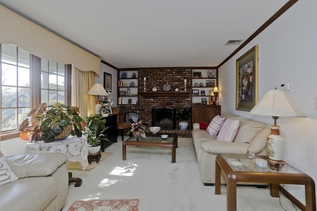 carpeted living room featuring visible vents, a brick fireplace, and crown molding