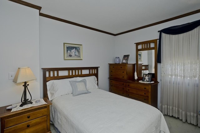 carpeted bedroom with crown molding