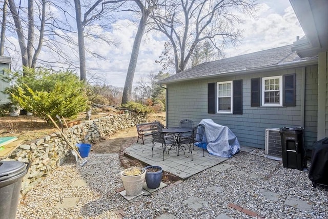 view of patio / terrace with central AC unit