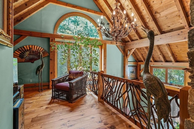 94 S Shore Rd, Burrillville, RI 02859 - sitting room featuring a chandelier, wood ceiling, hardwood / wood-style flooring, and an upstairs landing