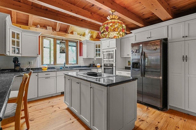 94 S Shore Rd, Burrillville, RI 02859 - kitchen with stainless steel appliances, wooden ceiling with exposed beams, backsplash, a sink, and light wood-type flooring