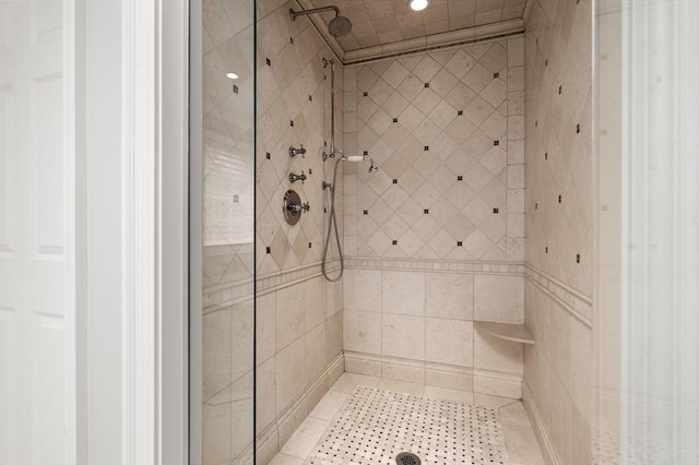 bathroom with a shower stall