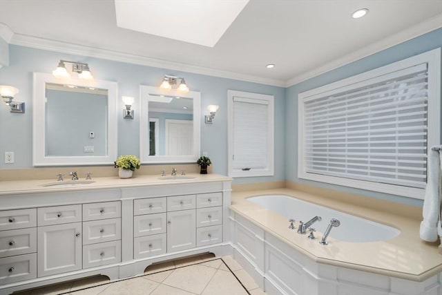 bathroom with crown molding, double vanity, a sink, and tile patterned floors