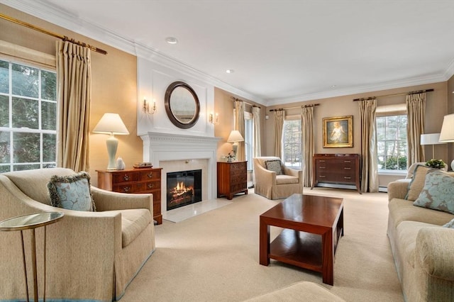 living area with a premium fireplace, baseboard heating, carpet flooring, and crown molding