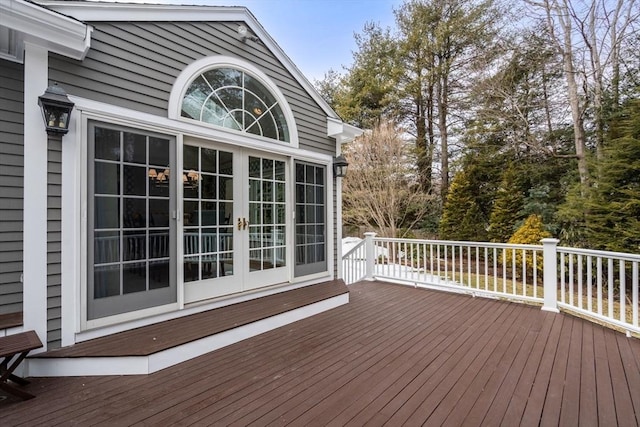 wooden deck featuring french doors