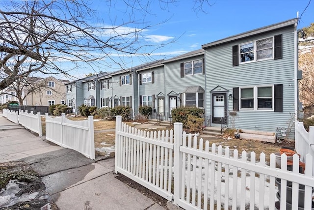 5257 Washington St Unit 5257, Boston, MA 02132 - multi unit property featuring a fenced front yard and a residential view