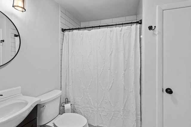 5257 Washington St Unit 5257, Boston, MA 02132 - full bath featuring vanity, toilet, and shower / tub combo with curtain