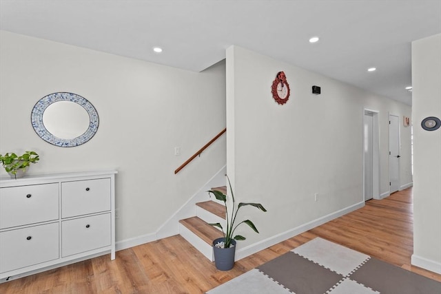 5257 Washington St Unit 5257, Boston, MA 02132 - stairs with wood finished floors, baseboards, and recessed lighting
