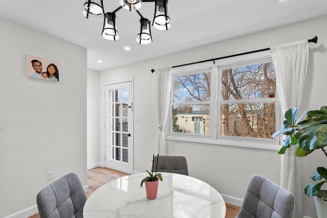 5257 Washington St Unit 5257, Boston, MA 02132 - dining space with a chandelier, recessed lighting, baseboards, and wood finished floors