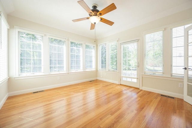 2 Pine Ridge Ln, Mattapoisett, MA 02739 - unfurnished sunroom with baseboards and wood finished floors