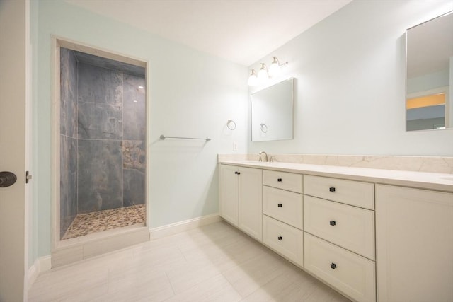 2 Pine Ridge Ln, Mattapoisett, MA 02739 - full bath featuring double vanity, a tile shower, and baseboards