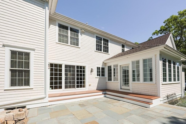 2 Pine Ridge Ln, Mattapoisett, MA 02739 - back of property with a patio and a shingled roof