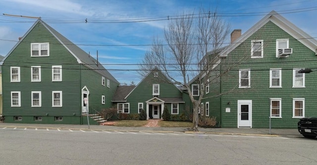 view of front facade with cooling unit